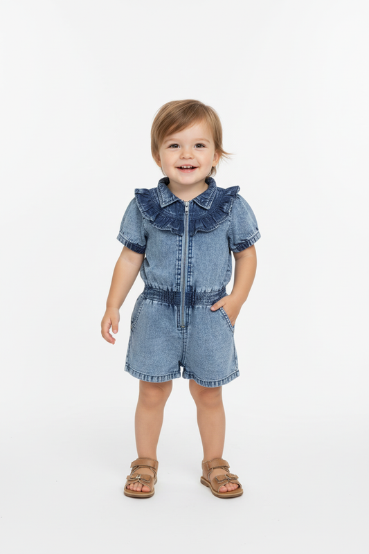2-year-old model wearing denim romper