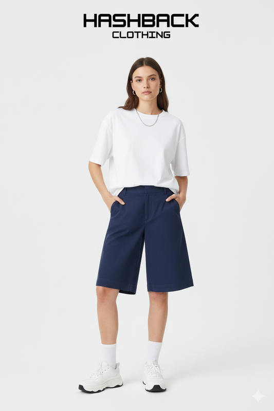 Model wearing navy blue cotton baggy shorts